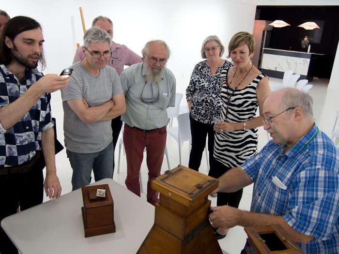 Sandy Barrie demonstrates ancient portable daylight enlargers – the oldest was made before 1859.