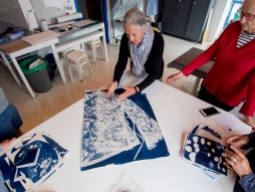 Robynne show her lace blouse cyanotype